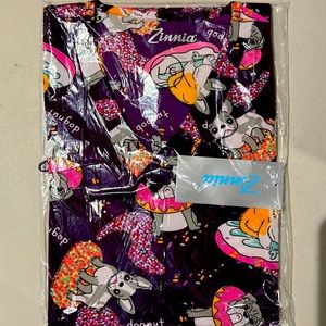 5 printed scrub tops. 93%polyester 7%spandex size large